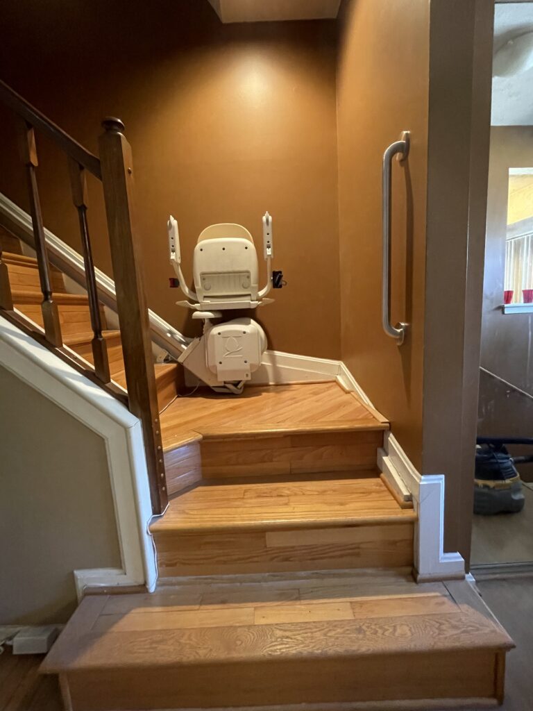 Stainless Steel Grab Bar at a stair landing