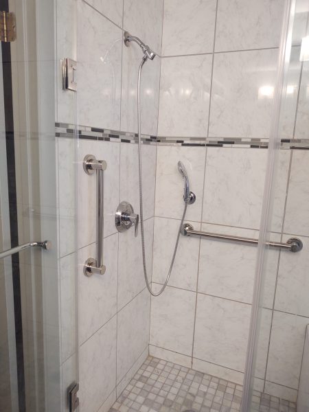 Polished Stainless Grab Bars in tile